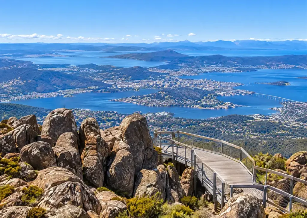 Panoramic scenic view from the summit boardwalk of Mount Wellington overlooking Hobart city and the Derwent River estuary